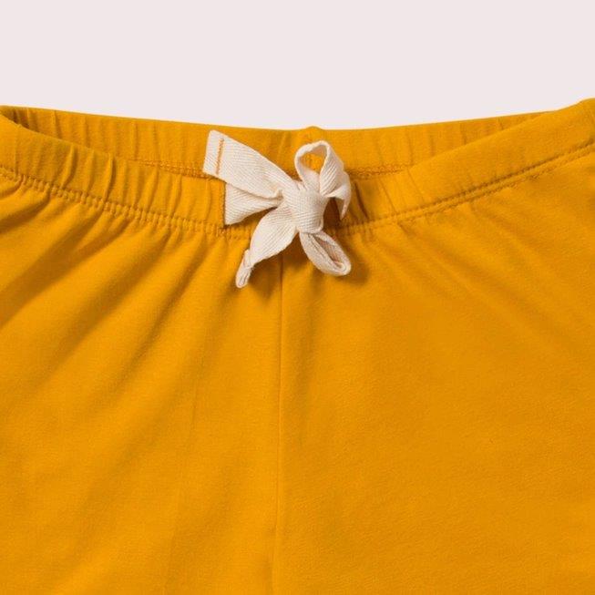 Pantalones cortos Run Around Gold - Olokuti